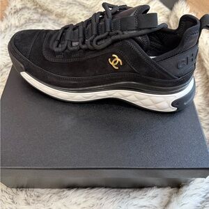 CHANEL Black and Gold Sneakers